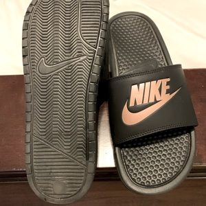 Nike black and rose gold letters